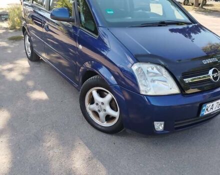 Синий Опель Мерива, объемом двигателя 1.6 л и пробегом 185 тыс. км за 4300 $, фото 3 на Automoto.ua