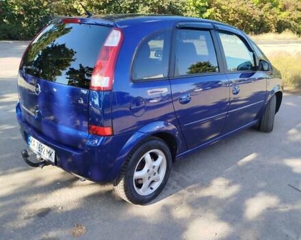 Синий Опель Мерива, объемом двигателя 1.6 л и пробегом 185 тыс. км за 4300 $, фото 7 на Automoto.ua