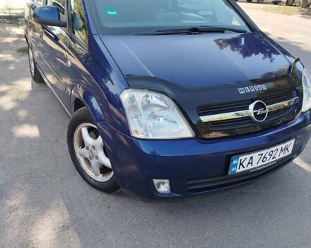 Синий Опель Мерива, объемом двигателя 1.6 л и пробегом 185 тыс. км за 4300 $, фото 2 на Automoto.ua