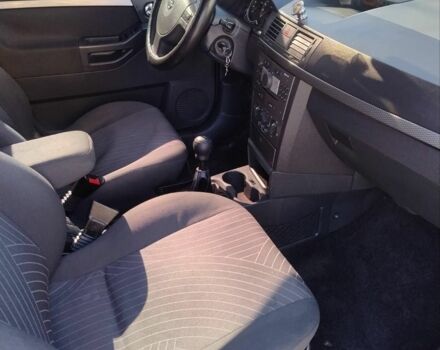 Синий Опель Мерива, объемом двигателя 1.6 л и пробегом 224 тыс. км за 3200 $, фото 12 на Automoto.ua