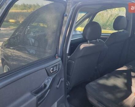 Синий Опель Мерива, объемом двигателя 1.4 л и пробегом 202 тыс. км за 5100 $, фото 15 на Automoto.ua