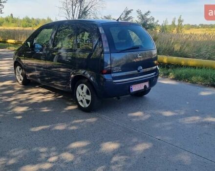 Синий Опель Мерива, объемом двигателя 1.4 л и пробегом 202 тыс. км за 5100 $, фото 4 на Automoto.ua