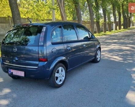 Синий Опель Мерива, объемом двигателя 1.4 л и пробегом 202 тыс. км за 5100 $, фото 7 на Automoto.ua