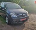Синий Опель Мерива, объемом двигателя 1.4 л и пробегом 201 тыс. км за 5400 $, фото 1 на Automoto.ua