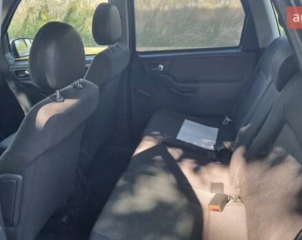 Синий Опель Мерива, объемом двигателя 1.4 л и пробегом 202 тыс. км за 5100 $, фото 16 на Automoto.ua