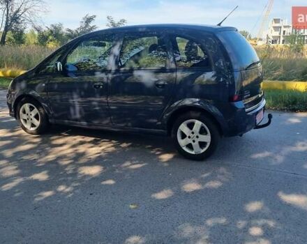 Синий Опель Мерива, объемом двигателя 1.4 л и пробегом 202 тыс. км за 5100 $, фото 3 на Automoto.ua