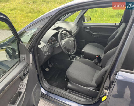 Синий Опель Мерива, объемом двигателя 1.4 л и пробегом 214 тыс. км за 4950 $, фото 12 на Automoto.ua