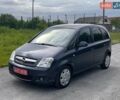 Синий Опель Мерива, объемом двигателя 1.4 л и пробегом 214 тыс. км за 4699 $, фото 2 на Automoto.ua