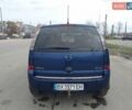 Синий Опель Мерива, объемом двигателя 1.3 л и пробегом 303 тыс. км за 5000 $, фото 4 на Automoto.ua