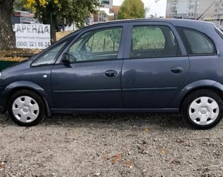 Синий Опель Мерива, объемом двигателя 1.6 л и пробегом 190 тыс. км за 4900 $, фото 5 на Automoto.ua