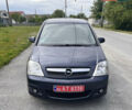 Синий Опель Мерива, объемом двигателя 1.4 л и пробегом 214 тыс. км за 4950 $, фото 1 на Automoto.ua
