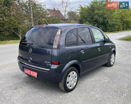 Синий Опель Мерива, объемом двигателя 1.4 л и пробегом 214 тыс. км за 4950 $, фото 6 на Automoto.ua
