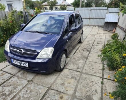 Синий Опель Мерива, объемом двигателя 1.6 л и пробегом 270 тыс. км за 4200 $, фото 1 на Automoto.ua