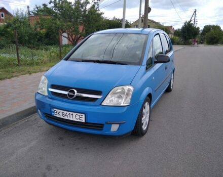 Синий Опель Мерива, объемом двигателя 1.6 л и пробегом 287 тыс. км за 4000 $, фото 1 на Automoto.ua
