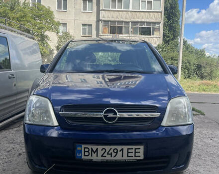 Синий Опель Мерива, объемом двигателя 1.6 л и пробегом 207 тыс. км за 3900 $, фото 1 на Automoto.ua