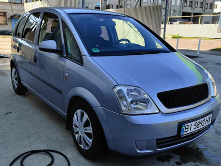 Синий Опель Мерива, объемом двигателя 1.6 л и пробегом 296 тыс. км за 3600 $, фото 1 на Automoto.ua