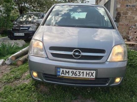Синий Опель Мерива, объемом двигателя 1.8 л и пробегом 160 тыс. км за 3200 $, фото 1 на Automoto.ua