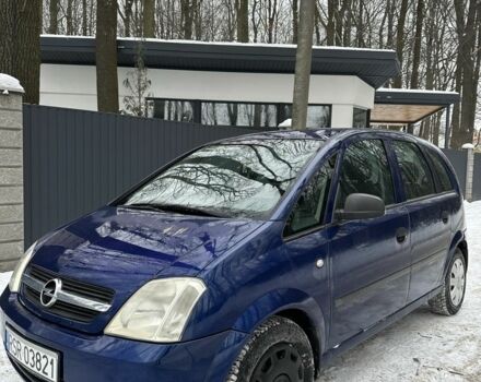 Синий Опель Мерива, объемом двигателя 1.7 л и пробегом 260 тыс. км за 1650 $, фото 1 на Automoto.ua