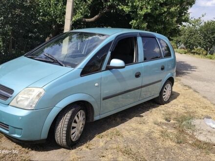 Синий Опель Мерива, объемом двигателя 1.6 л и пробегом 201 тыс. км за 4700 $, фото 1 на Automoto.ua