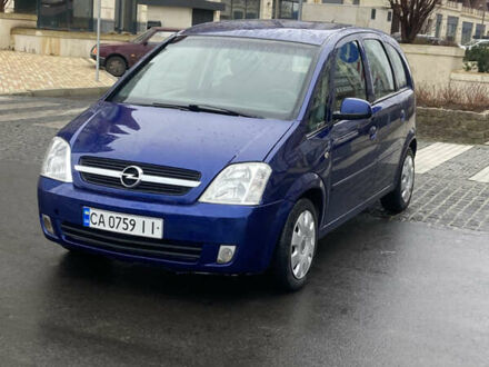 Синий Опель Мерива, объемом двигателя 1.2 л и пробегом 400 тыс. км за 2899 $, фото 1 на Automoto.ua
