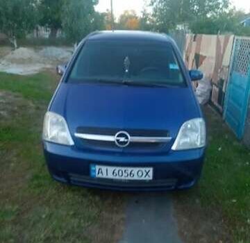 Синий Опель Мерива, объемом двигателя 1.7 л и пробегом 300 тыс. км за 3800 $, фото 1 на Automoto.ua