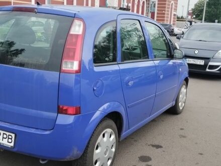 Синий Опель Мерива, объемом двигателя 1.6 л и пробегом 189 тыс. км за 4100 $, фото 1 на Automoto.ua