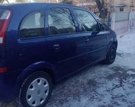 Синий Опель Мерива, объемом двигателя 1.6 л и пробегом 255 тыс. км за 4400 $, фото 1 на Automoto.ua