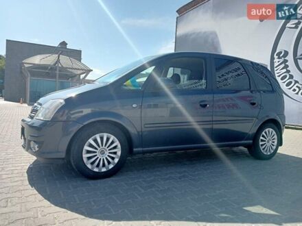 Синий Опель Мерива, объемом двигателя 1.36 л и пробегом 242 тыс. км за 4158 $, фото 1 на Automoto.ua