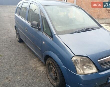 Синий Опель Мерива, объемом двигателя 1.25 л и пробегом 260 тыс. км за 2100 $, фото 1 на Automoto.ua