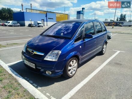 Синий Опель Мерива, объемом двигателя 1.7 л и пробегом 255 тыс. км за 2900 $, фото 1 на Automoto.ua