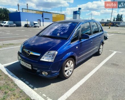 Синий Опель Мерива, объемом двигателя 1.7 л и пробегом 255 тыс. км за 2900 $, фото 1 на Automoto.ua