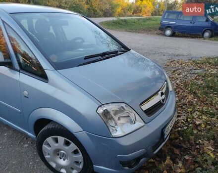 Синий Опель Мерива, объемом двигателя 1.36 л и пробегом 178 тыс. км за 4400 $, фото 1 на Automoto.ua