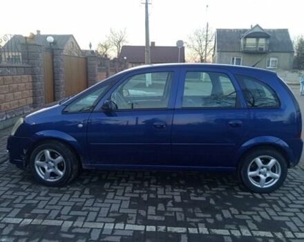 Синий Опель Мерива, объемом двигателя 1.3 л и пробегом 200 тыс. км за 4500 $, фото 1 на Automoto.ua