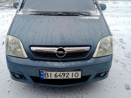 Синий Опель Мерива, объемом двигателя 1.6 л и пробегом 239 тыс. км за 4850 $, фото 1 на Automoto.ua