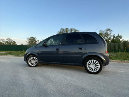 Синий Опель Мерива, объемом двигателя 1.69 л и пробегом 262 тыс. км за 3550 $, фото 1 на Automoto.ua