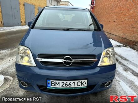 Синий Опель Мерива, объемом двигателя 1.6 л и пробегом 300 тыс. км за 3700 $, фото 1 на Automoto.ua