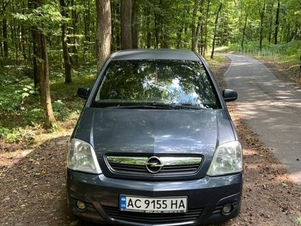 Синий Опель Мерива, объемом двигателя 1.3 л и пробегом 271 тыс. км за 3850 $, фото 1 на Automoto.ua