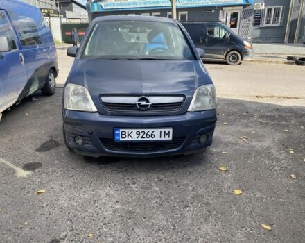 Синий Опель Мерива, объемом двигателя 1.4 л и пробегом 196 тыс. км за 2599 $, фото 1 на Automoto.ua