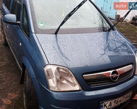 Синий Опель Мерива, объемом двигателя 1.6 л и пробегом 320 тыс. км за 3500 $, фото 1 на Automoto.ua