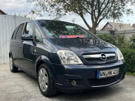 Синий Опель Мерива, объемом двигателя 1.4 л и пробегом 214 тыс. км за 4699 $, фото 1 на Automoto.ua