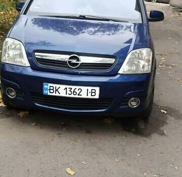 Синий Опель Мерива, объемом двигателя 1.6 л и пробегом 285 тыс. км за 4150 $, фото 1 на Automoto.ua