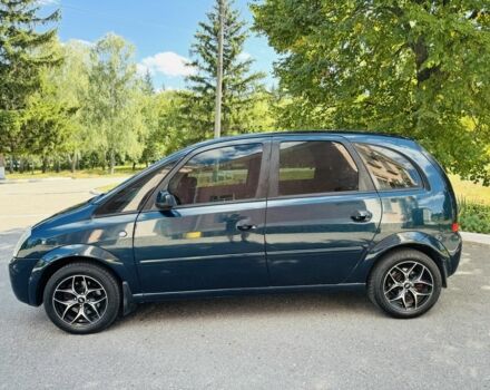 Зеленый Опель Мерива, объемом двигателя 1.6 л и пробегом 107 тыс. км за 4500 $, фото 1 на Automoto.ua