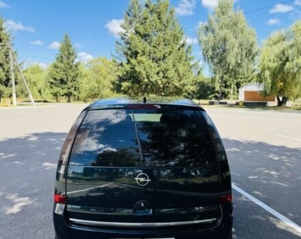 Зеленый Опель Мерива, объемом двигателя 1.6 л и пробегом 107 тыс. км за 4500 $, фото 3 на Automoto.ua