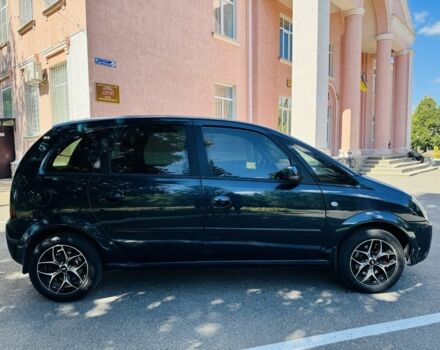 Зеленый Опель Мерива, объемом двигателя 1.6 л и пробегом 107 тыс. км за 4500 $, фото 6 на Automoto.ua