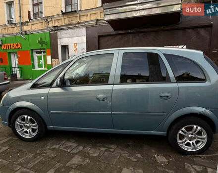 Зеленый Опель Мерива, объемом двигателя 1.6 л и пробегом 242 тыс. км за 4000 $, фото 1 на Automoto.ua