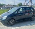Зеленый Опель Мерива, объемом двигателя 1.7 л и пробегом 224 тыс. км за 1350 $, фото 1 на Automoto.ua