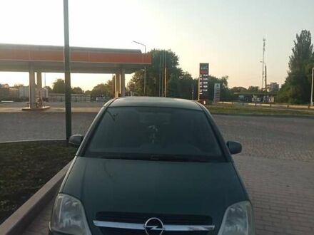Зелений Опель Меріва, об'ємом двигуна 1.59 л та пробігом 252 тис. км за 3750 $, фото 1 на Automoto.ua