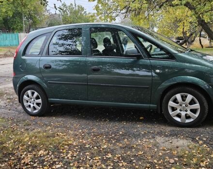 Зеленый Опель Мерива, объемом двигателя 1.6 л и пробегом 320 тыс. км за 5500 $, фото 1 на Automoto.ua