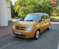 Помаранчевий Опель Меріва, об'ємом двигуна 1.6 л та пробігом 200 тис. км за 2700 $, фото 1 на Automoto.ua
