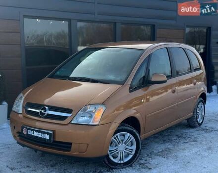 Оранжевый Опель Мерива, объемом двигателя 1.4 л и пробегом 298 тыс. км за 2700 $, фото 1 на Automoto.ua